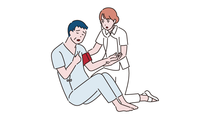 急変患者とアセスメントを行う看護師